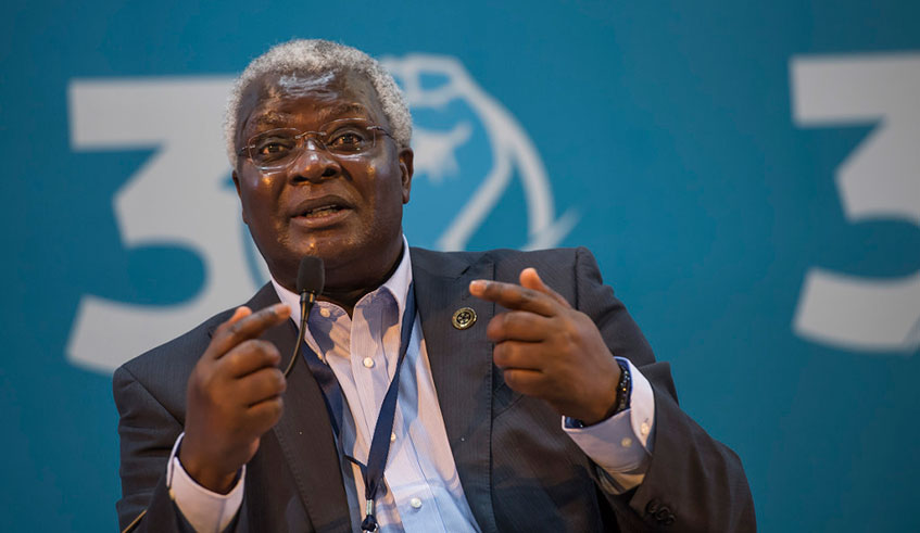 Dr Niyikiza speaks at a past event in Kigali. File.