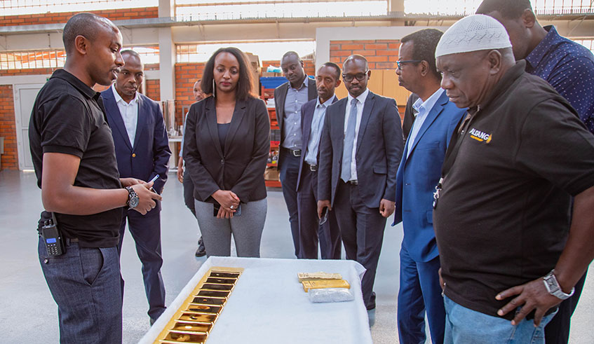 Officials tour a gold refinery in Kigali in June. Rwanda hopes that local mineral refineries will cushion the mining sector from price fluctuations on the international market.  Emmanuel Kwizera.