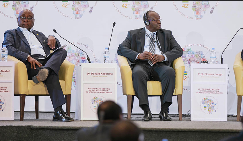 Dr Kaberuka and Prof Frolens Luonga, the Governor of Tanzania Central Bank, on a panel during the 42nd Ordinary meeting of the Association of African central banks in Kigali yesterday. E. Kwizera.