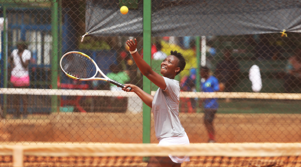 Joselyne Umulisa reached the semi-finals of this yearu2019s Cogebank Tennis Tournament after beating Olive Tuyishime (not in the photo) at Cercle Sportif de Kigali on Thursday. / Sam Ngendahimana