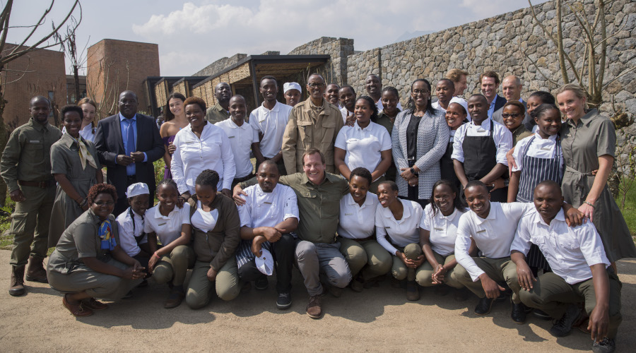 Tour guides, local leaders and employees of Singita Kwitonda Lodge and Kataza House pose for a photo with President Paul Kagame and First Lady Jeannette Kagame at the inauguration of the facility in Musanze District yesterday. The $25 million facility is Rwandau2019s first tourism establishment under the high-end tourism brand. / Village Urugwiro