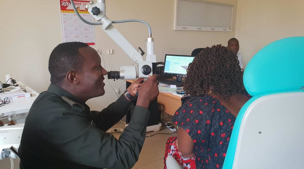 Dr John Bukuru examining ears of one of his patients. / All photos by James P. Nkurunziza