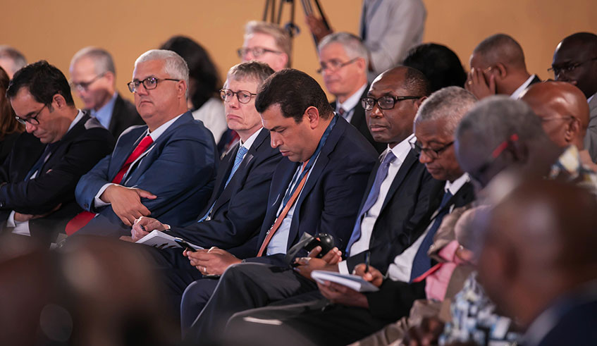 Delegates follow Dr Gerardine Mukeshimana, the Minister of Agriculture as she addresses the conference in Kigali yesterday. Emmanuel Kwizera.