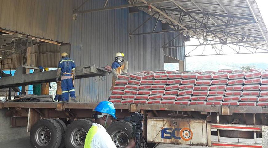 Workers load cement onto a truck at Cimerwa plant in Rusizi District. Rwanda Development Board is in the process to select the best investor to take Government shares in Cimerwa. / File