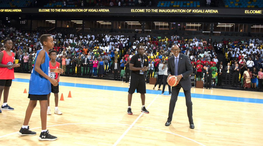 President Kagame dribbles the ball inside the Kigali Arena shortly after he inaugurated the 10,000-seater facility located just next to Amahoro National Stadium in Remera, Gasabo District. The President said the new facility is an opportunity to, among other functions, unleash basketball talent in youth, which he said was the major inspiration behind the arena.  Village Urugwiro.