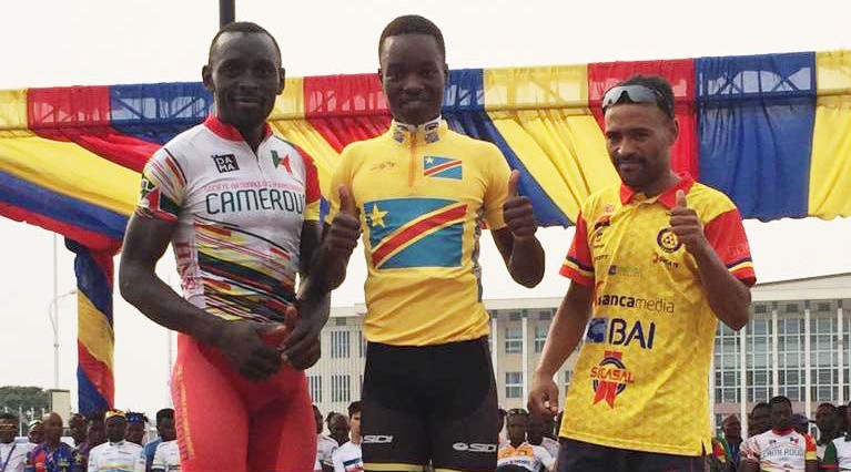 Benediction Excel Energyu2019s Nzafashwanayo (c) in a yellow jersey after winning Tour of DRC in Kinshasa yesterday. / Courtesy