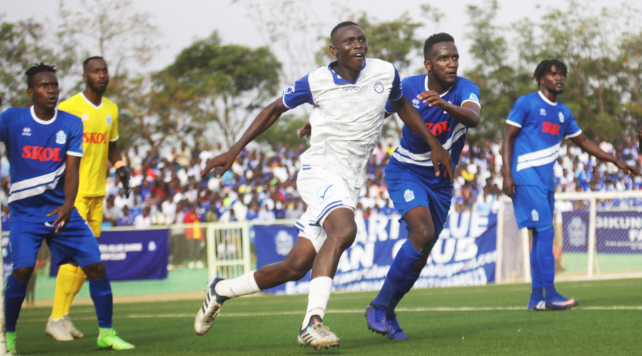 Rayon Sportsu2019 midfielder Imuran Nshimiyimana battles for the ball with Al Hilal striker during a 1-1 draw at Kigali Stadium on Sunday. / Sam Ngendahimana