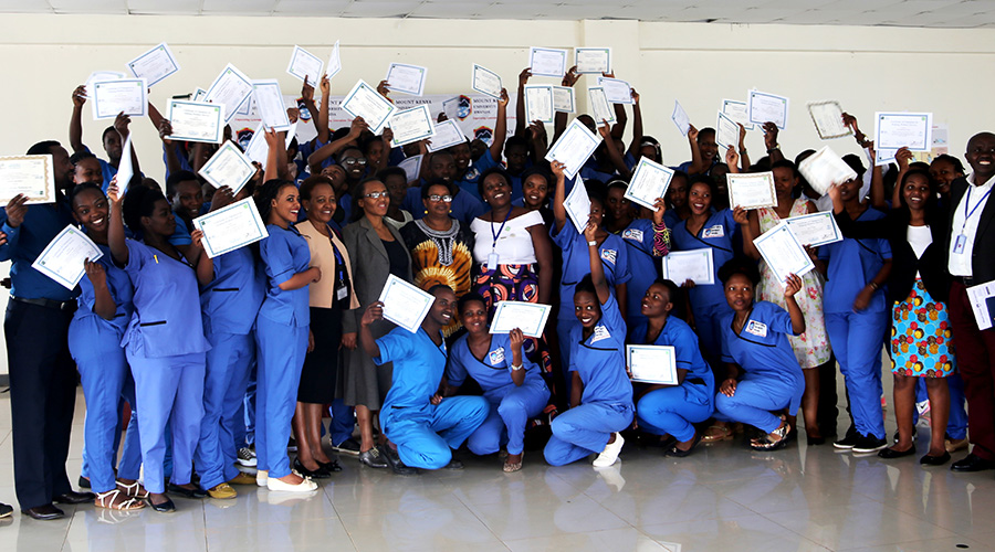 Mount Kenya University students receive certificates as midwives after training on Thursday. / Craish Bahizi