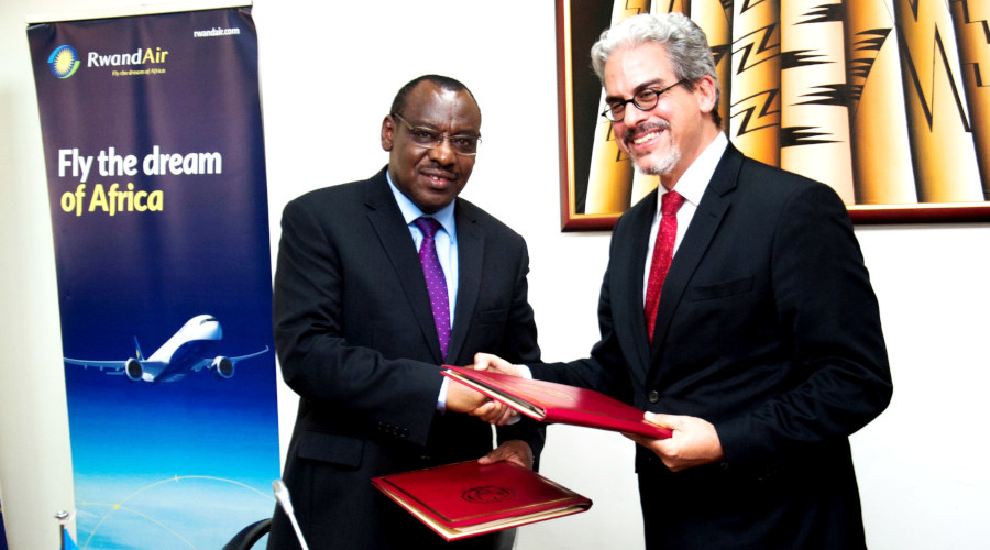 Minister of Infrastructure, Claver Gatete and Brazilian ambassador to Rwanda, Fernando Estellita Lins de Salvo Coimbra, signing Bilateral Air Service Agreement on Wednesday. / Craish Bahizi