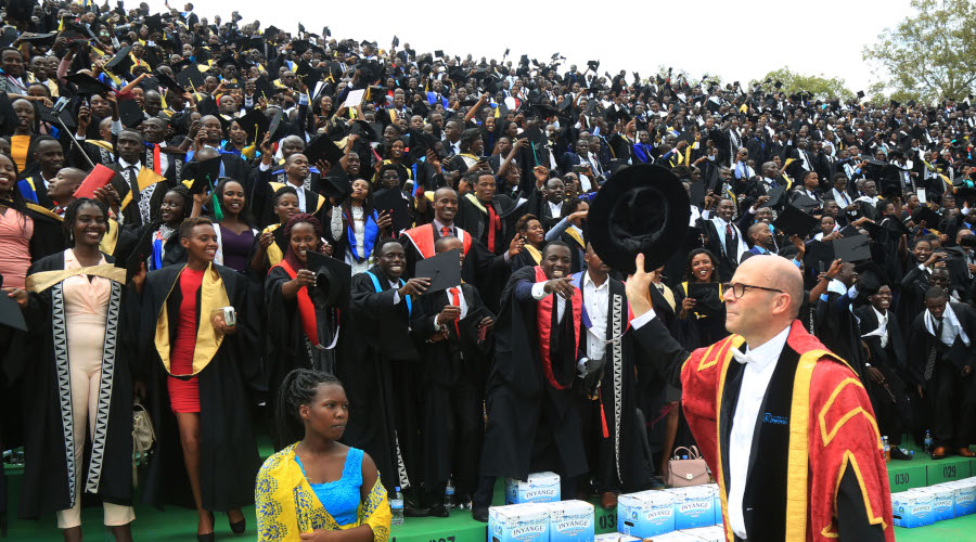 Prof Philip Cotton, University of Rwandau2019s Vice-Chancellor, greets students at the graduation ceremony held in Huye last year. / Sam Ngendahimana