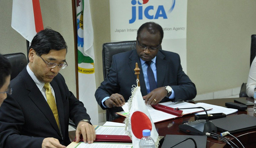 Minister for Finance and Economic Planning Uzziel Ndagijimana (right) and Amb. Takayuki Miyashita, the Japanese envoy to Rwanda during the signing of the concessional loan at the Finance ministry in Kigali yesterday. The loan will be repaid in 40 years and has a grace period of 10 years.  Courtesy.