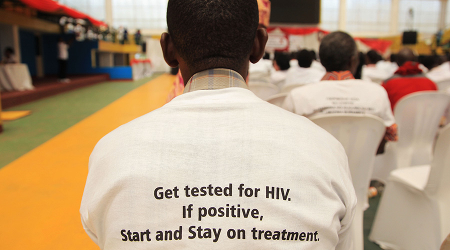 A participant during a recent conference that discussed AIDS prevention wears a T-shirt calling on people to get tested for HIV. / Sam Ngendahimana
