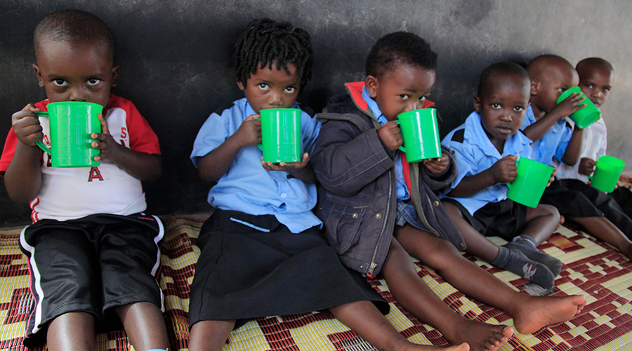 Children take porridge at Mageragere Early Childhood Development Centre in Nyarugenge District. / Sam Ngendahimana