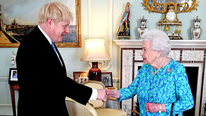 Boris Johnson greets the Queen during his first visit as Prime Minister. 