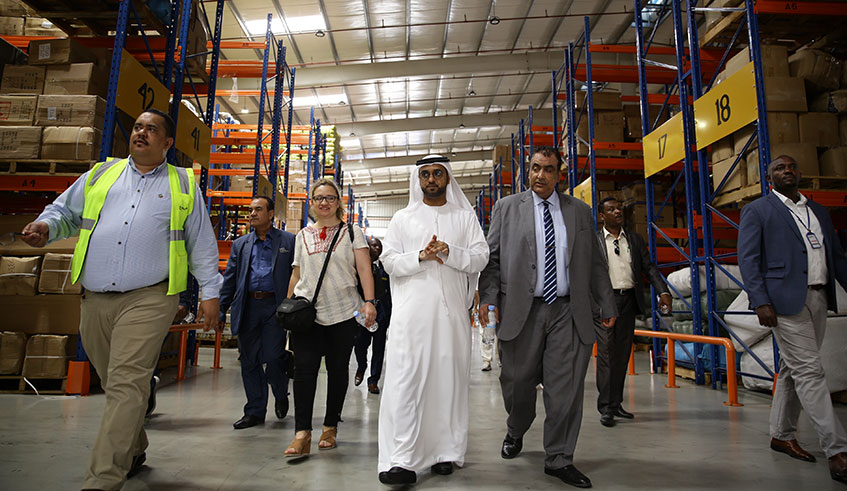 Mohammed Al Kamali the Deputy Chief Executive Officer of Dubai Exports (centre) and Carlos Salim Al Hashim, Vice President for Arab Union of Land Transport (3rd right) during the tour of the DP World facility with a delegation of over 17 business executives from about eight sectors of the Middle East country (UAE) at Dubai Port World in Masaka Sector, Kicukiro District, Kigali of Kigali yesterday. Emmanuel Kwizera.