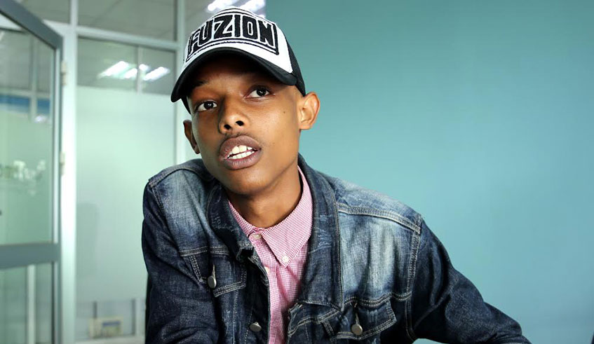 Upcoming singer Lionel Mugisha during the interview at our offices. Courtesy.