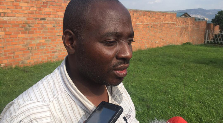 The late Silas Hategekimana speaks to the media shortly after his deportation from Uganda. / Courtesy