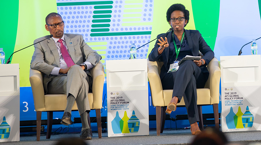 Bank of Kigali Group chief executive Diane Karusisi (right) speaks on a panel during the 11th Alliance for Financial Inclusion Global Policy Forum 2019 in Kigali on September 12. Looking on is National Bank of Rwanda governor John Rwangombwa. / Emmanuel Kwizera