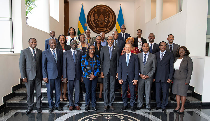President Paul Kagame and members of the East African Business Council as well as other officials at Village Urugwiro yesterday. During the meeting, the business leaders outlined the challenges that still hold back trade and integration.  Village Urugwiro