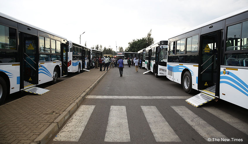 Passengers wait to board a bus at Kacyiru Bus Park in Kigali. According to a report by the National Institute of Statistics of Rwanda, the transport sector registered a 17 per cent growth between April and June this year. Emmanuel Kwizera.