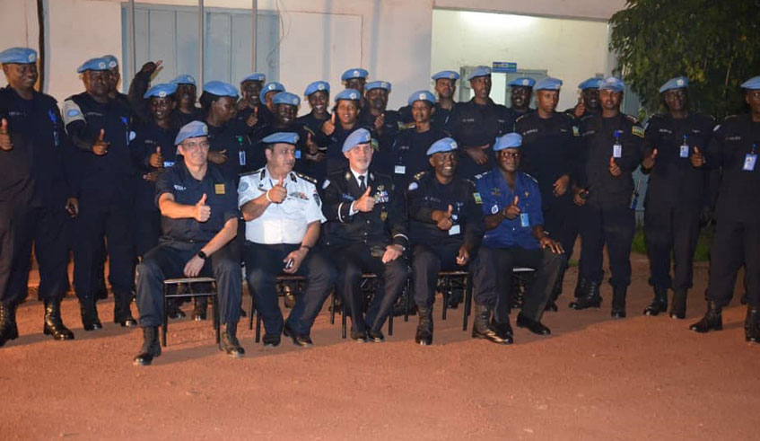 UN Police Advisor Maj Gen Luu00eds Carrilho with  the Rwandan peacekeeping contigent in CAR. Courtesy.
