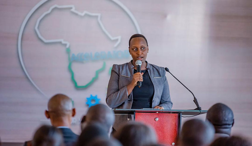 Geraldine Umutesi, the deputy director-general of Imbuto Foundation, recites a moving poem about the predicaments of teen mothers and teen pregnancy. Courtesy.