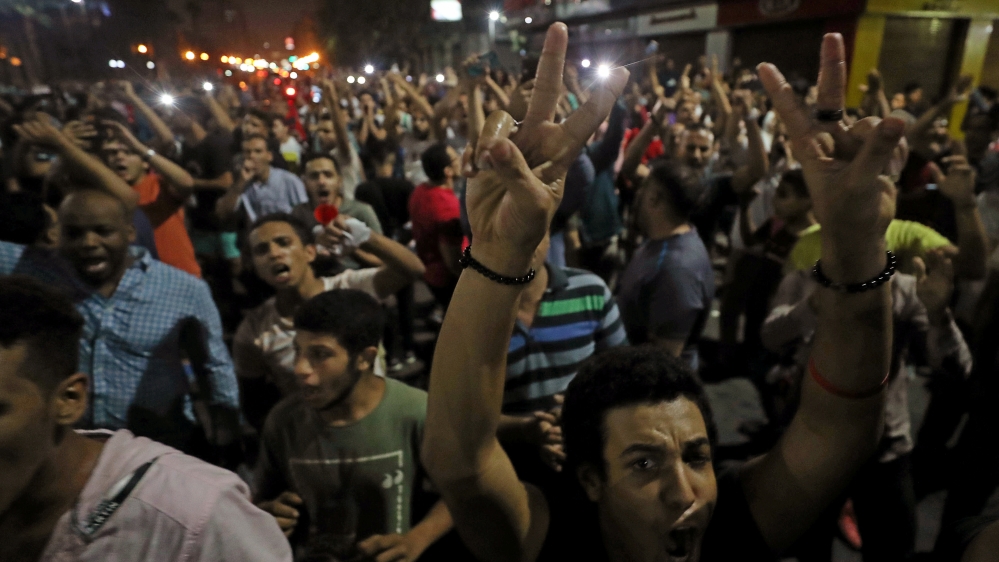 Small groups of protesters gather in central Cairo shouting anti-government slogans in Cairo. / Reuters