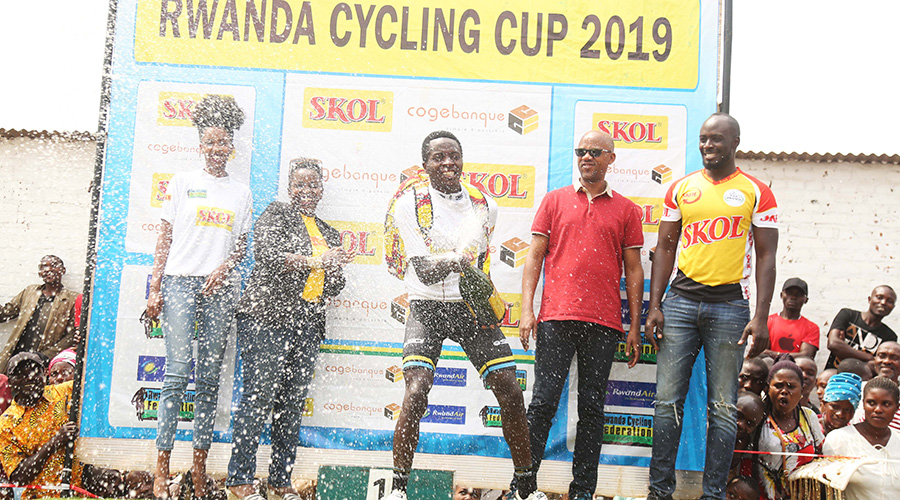 Didier Munyaneza (C) holds the record of the youngest rider to win (2018) the national road championships. / All photos by Sam Ngendahimana