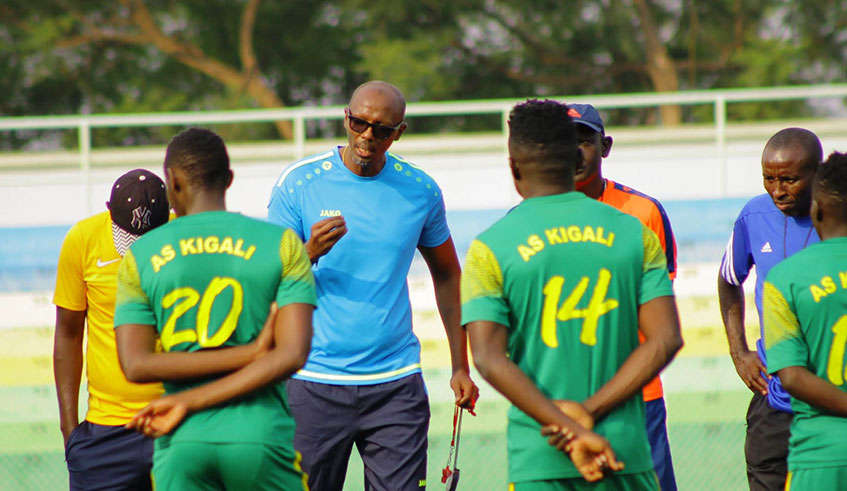 Eric Nshimiyimana gives instructions to his AS Kigali players during a past training session at Kigali Stadium. Courtesy.