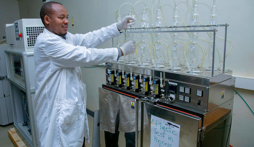 An employee of Rwanda Standards Board in one of the regulatoru2019s laboratories. The standards body is reluctant to license a local organisation to produce sanitary pads, citing safety concerns. Emmanuel Kwizera.  