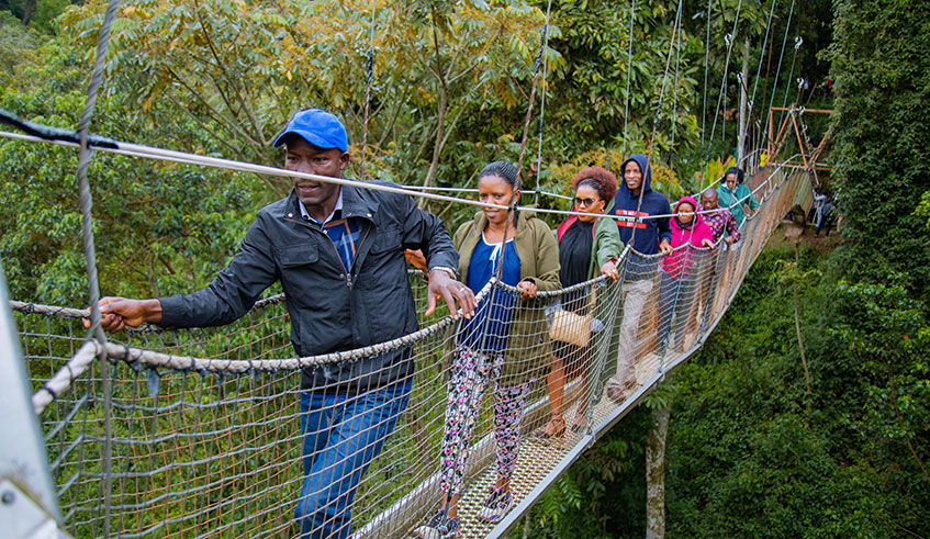 Local tourists on a 160m walk on the Canopy in Nyungwe National Park during. Emmanuel Kwizera.