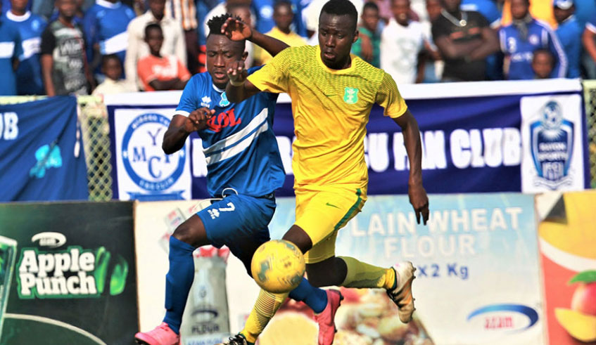 Rayon Sports striker Jules Ulimwengu (#7) vies for the ball with AS Kigali defender Latif Bishira during the two sidesu2019 semi-final clash in Peace Cup tournament in June. Sam Ngendahimana.