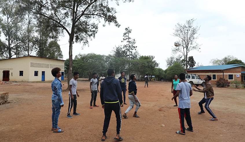 Some of the 66 African refugees and asylum-seekers from Libya play football at their new home at Gashora in Bugesera District last week. Courtesy.