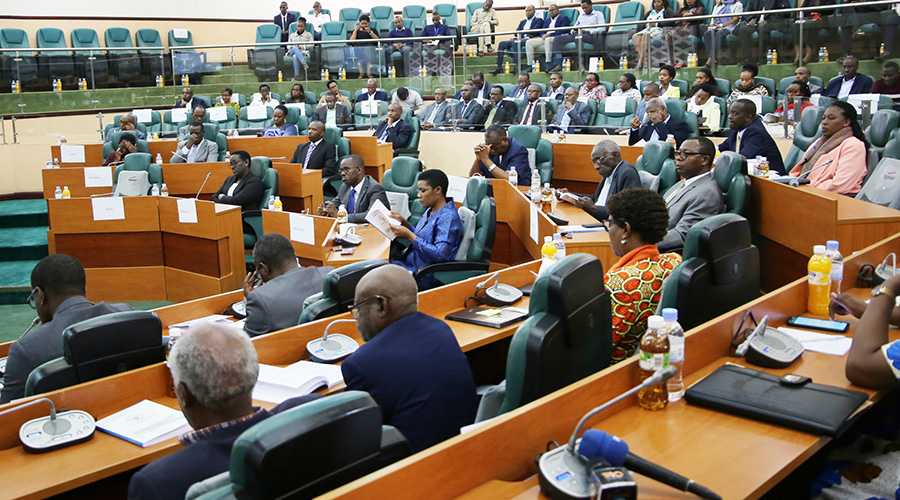 Senators and other officials follow proceedings during the presentation of research findings on genocide ideology and denial abroad, at the Parliamentary Buildings in Kigali yesterday. The lawmakers called on the Government to designate a special envoy that would spearhead efforts to check the vice. / Craish Bahizi