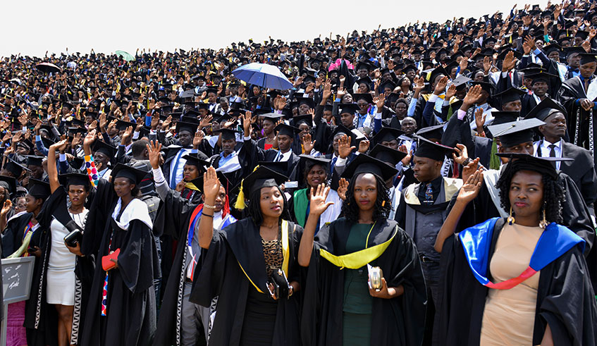 University of Rwanda students wave on their graduation day at Huye Stadium last year. Courtesy.