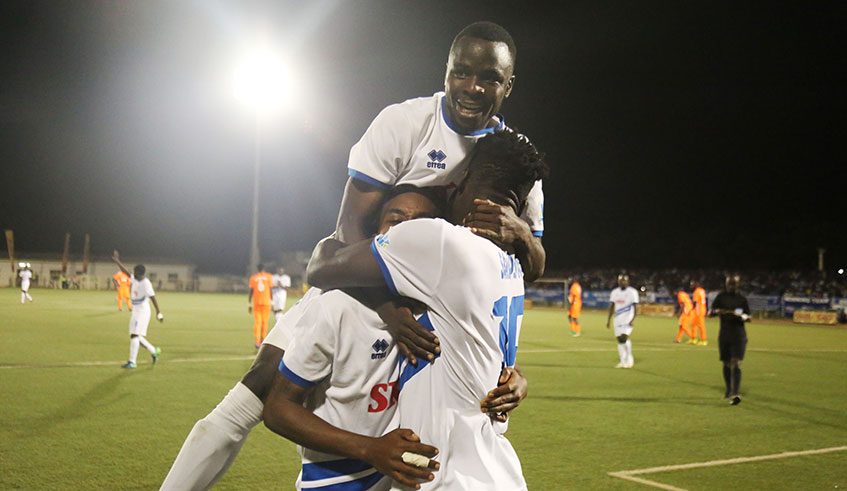 Gilbert Mugisha celebrates with teammates after scoring Rayon Sports' first goal during their 2-0 win over AS Kigali at Kigali Stadium on Tuesday. /Sam Ngendahimama