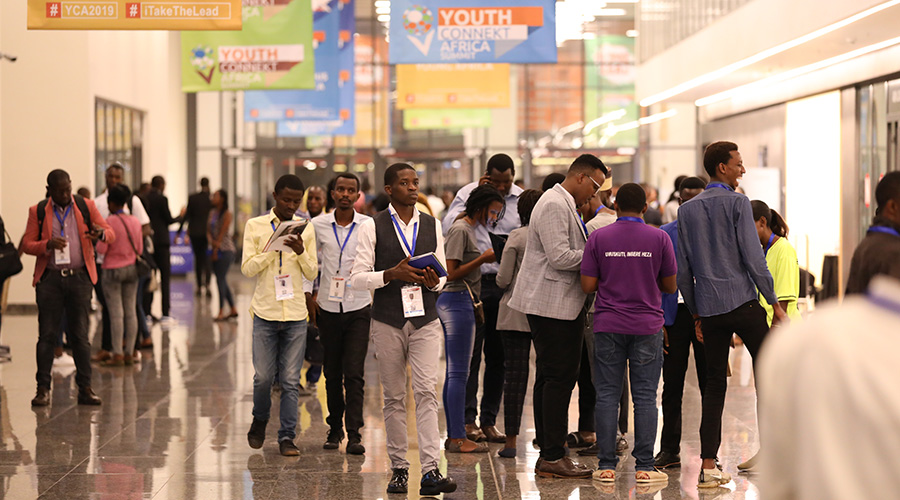 Delegates interact during a break at the YouthConnekt Africa 2019 Summit at Kigali Arena. With the African Continental Free Trade Area Agreement (AfCFTA), youth are tipped to work beyond their individual countries. / Emmanuel Kwizera
