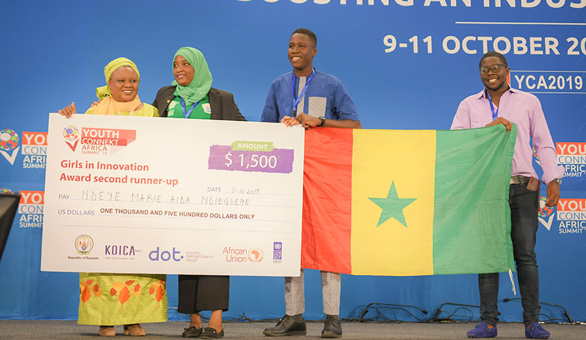Rwandan Blandine Umuziranenge (2nd L) awarded USD 5000. Emmanuel Kwizera