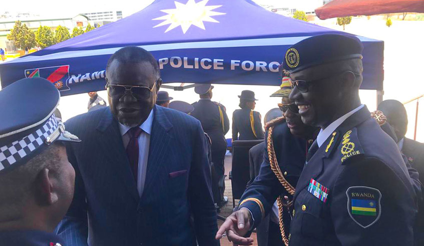 IGP Namibia, Gen. Sebastian Ndeitunga introducing ACP Shikongo Titus Shikongo, who attended the Police Senior Command and Staff Course in Rwanda, to Namibian President Dr. Hage G. Geingob as IGP Dan Munyuza looks on