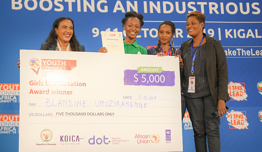 Rwandan Blandine Umuziranenge (2nd L) awarded USD 5000. Emmanuel Kwizera