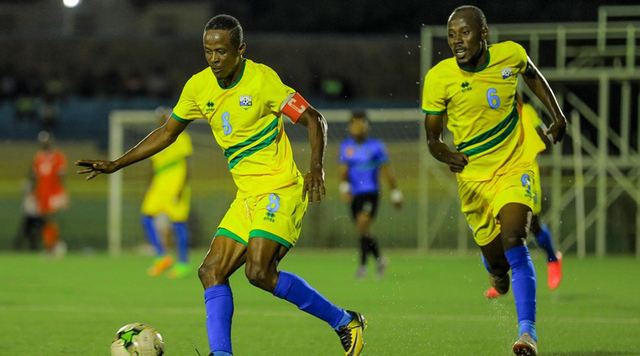 AS Kigali midfielders Haruna Niyonzima (with the ball) and Eric u2018Zidaneu2019 Nsabimana (#6) started against Tanzania during the goalless stalemate at Kigali Stadium on Monday night. / Courtesy