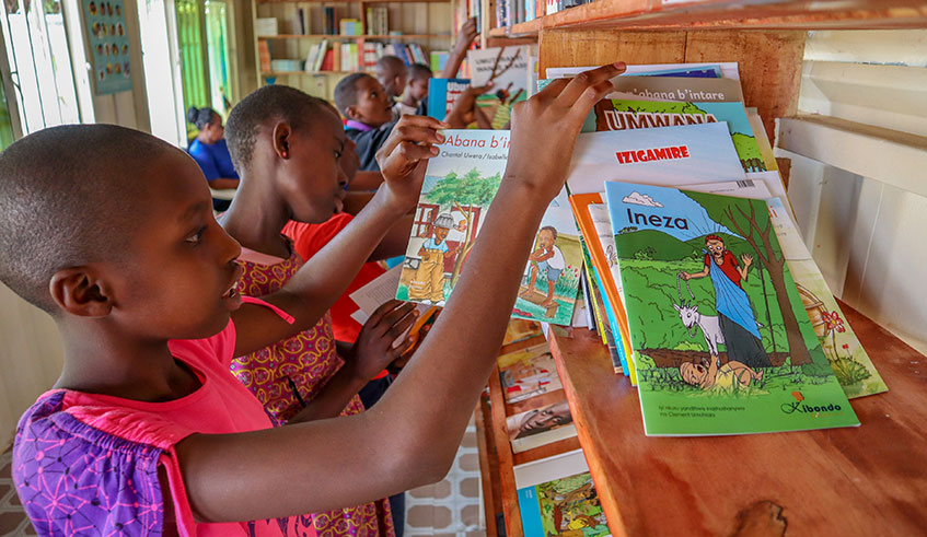 Children search for books to read in their library at Gasave Public Park Library. Photos by Faustin Niyigena.
