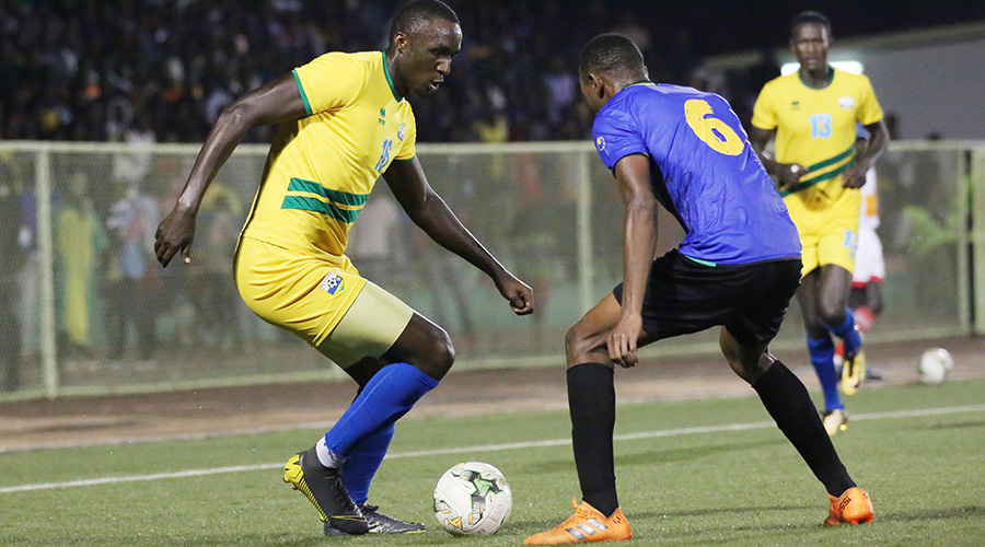 Ernest Sugira (L), seen here against Tanzania in a friendly game that ended goalless on Monday,  scored the solo goal as Rwanda beat Ethiopia in the first-leg last month. / Sam Ngensahimana