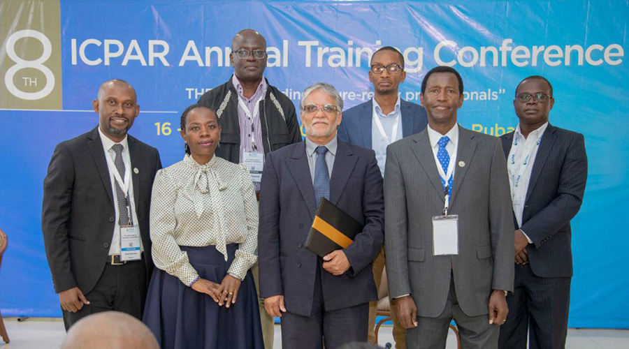 The central bank vice governor Monique Nsanzabaganwa (2nd left) poses with some economic professionals during a two-day training conference by the iCPAR that took place in Rubavu District. / Courtesy