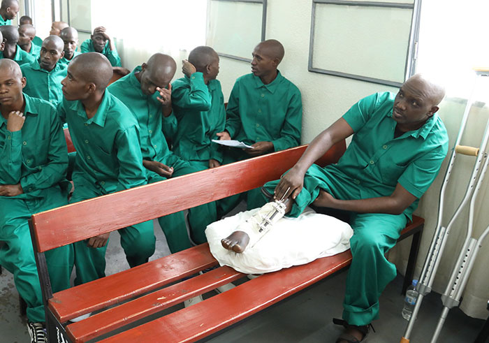 Habib Mudhatiru (with an injured leg) during the hearing on Monday. / Emmanuel Kwizera