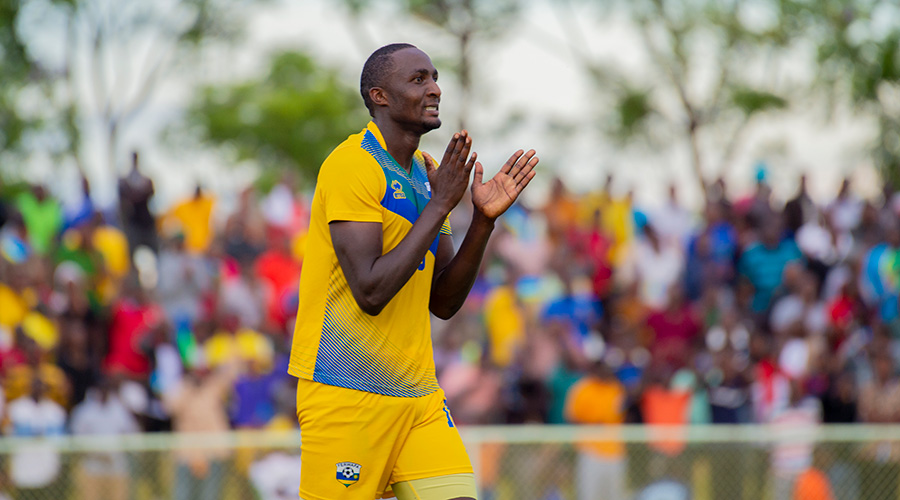 Ernest Sugira, 28, applauds the fans for their support after firing Rwanda to CHAN 2020 with a 83rd minute equaliser against Ethiopia at Kigali Stadium on Saturday. / Plaisir Muzogeye