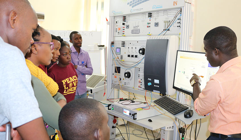 A student explains to his peers during a class discussion at the University of Rwandau2019s African Centre of Excellence in Energy for Sustainable Development in Kigali yesterday. Photo: Courtesy.