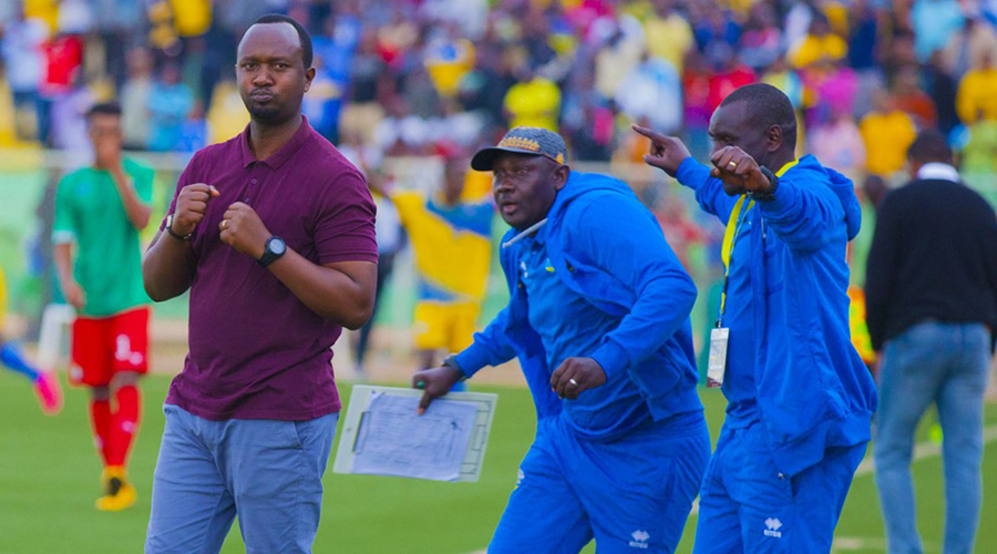 Amavubi head coach Vincent Mashami (L) and members of his technical staff celebrate after fighting back to draw 1-1 with Ethiopia at Kigali Stadium on Saturday. Rwanda had won 1-0 the first-leg last month. / Courtesy