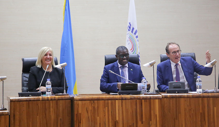 MP Bruno Fuchs, from France (right),  addresses the assembly at the Parliamentary Buildings in Kimihurura, Kigali yesterday. Looking on are MPs Emmanuel Bugingo (Rwanda) and Maryse Gaudreault, the Vice-President of National Assembly of Quebec (left). Photo: Craish Bahizi.