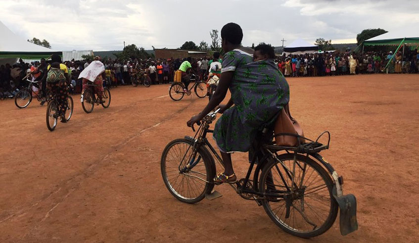 Women who are farmers have been given bicyles to transport agricultural produce including iron-rich beans. Courtesy.